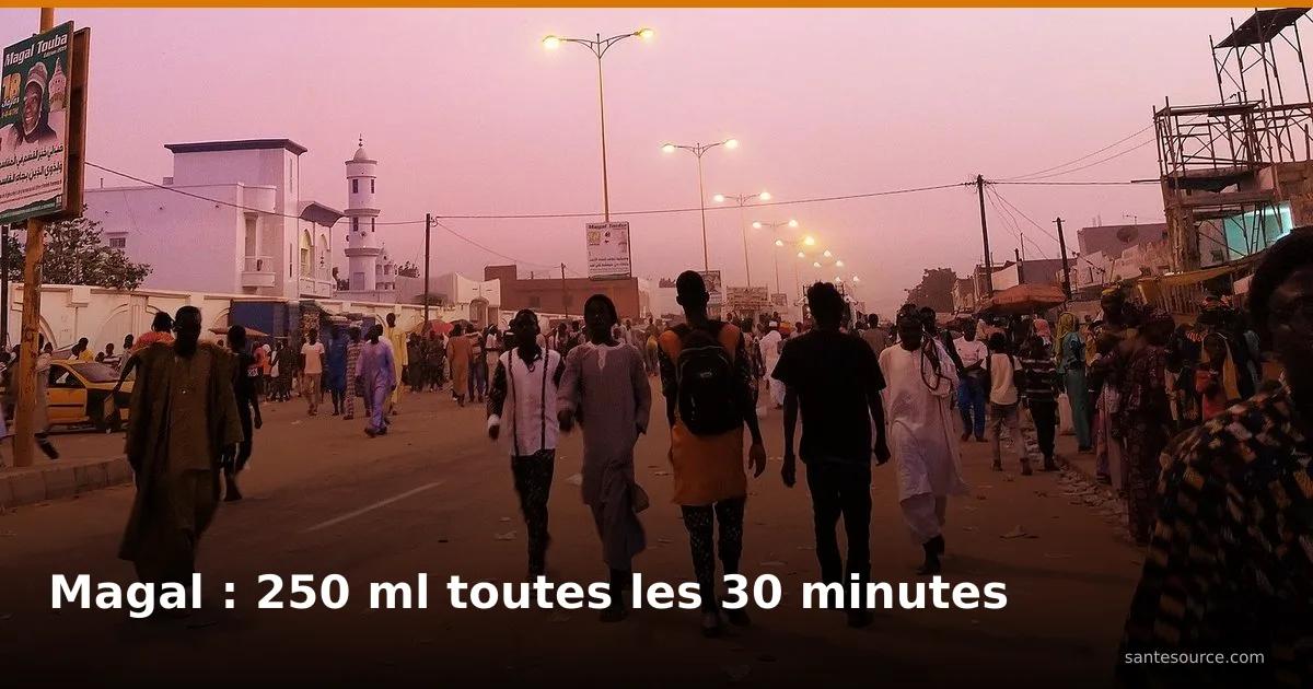 Pèlerins marchant vers la grande mosquée de Touba pendant le Magal, forte chaleur et risque de déshydratation